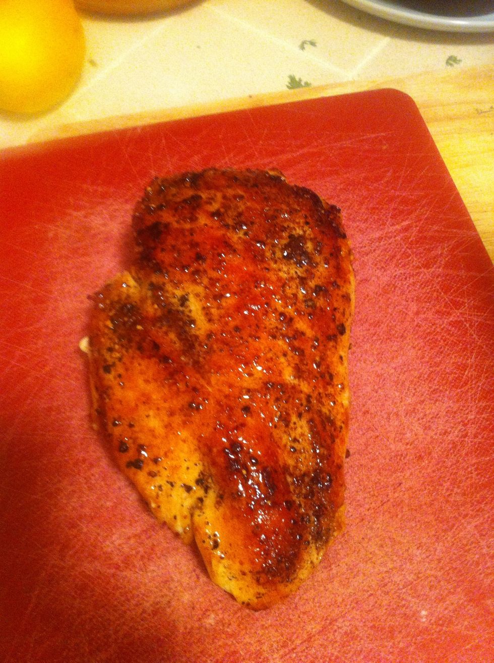 Now we're gonna let the chicken rest on a clean cutting board. It's been through a lot and needs a break. I know, you're thinking, "whoa buddy, I'm no animal rights activist," but just trust me.