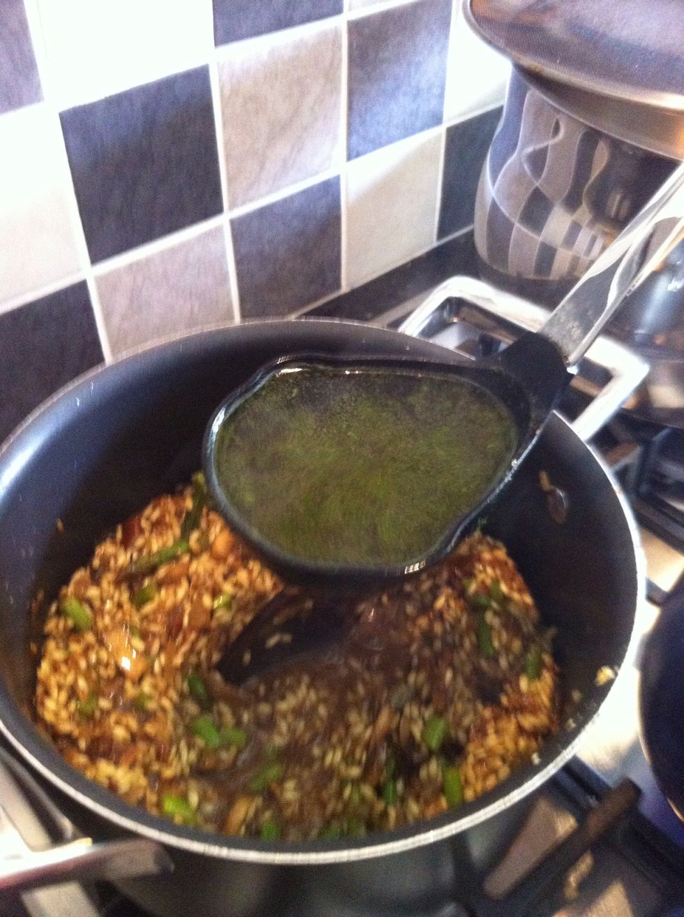 Now we start adding the water that contain veg cube  One spoon then stir for 2 minute till you feel it need more
