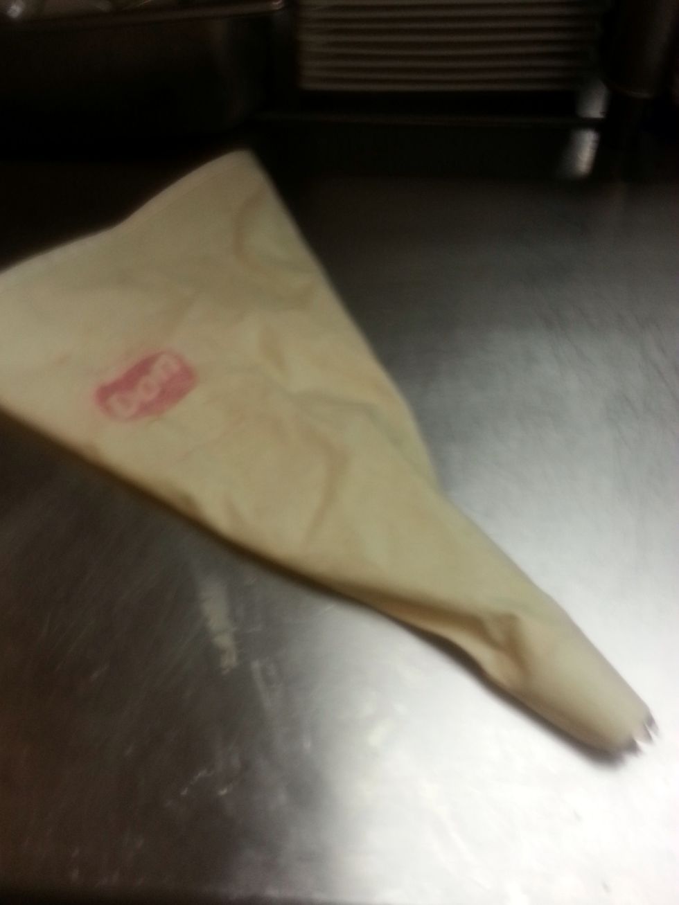 Now we use a pastry bag with a star tip or some people have use a frosting decorator too but I like the pastry bag better :-)