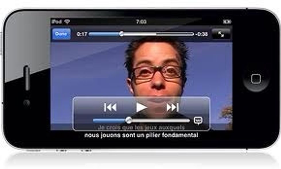 Now when you play a video in iTunes a little text bubble will appear on the player on the right if the video has subtitles. Tap it to turn them on and off.