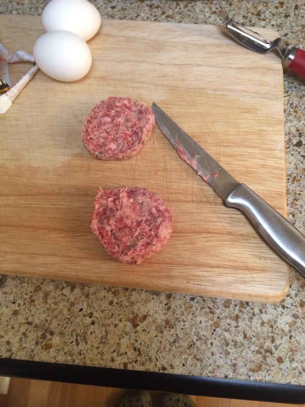 Now while the potatoes are cooking go ahead and cut your sausage patties