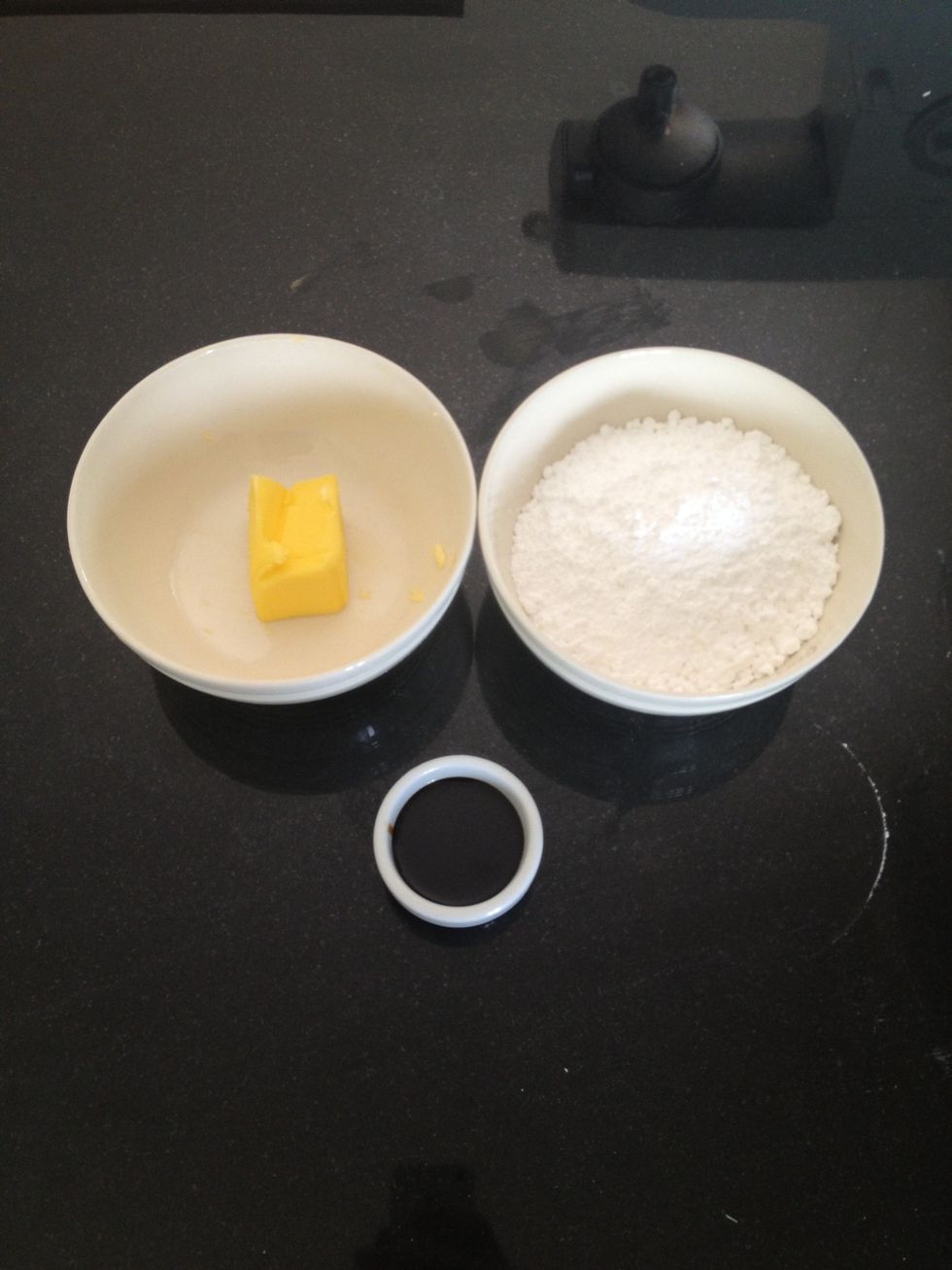 Now while you wait, it's time to make the icing For this the Icing Sugar, 2 tablespoons of Strong Coffee and Butter is needed.