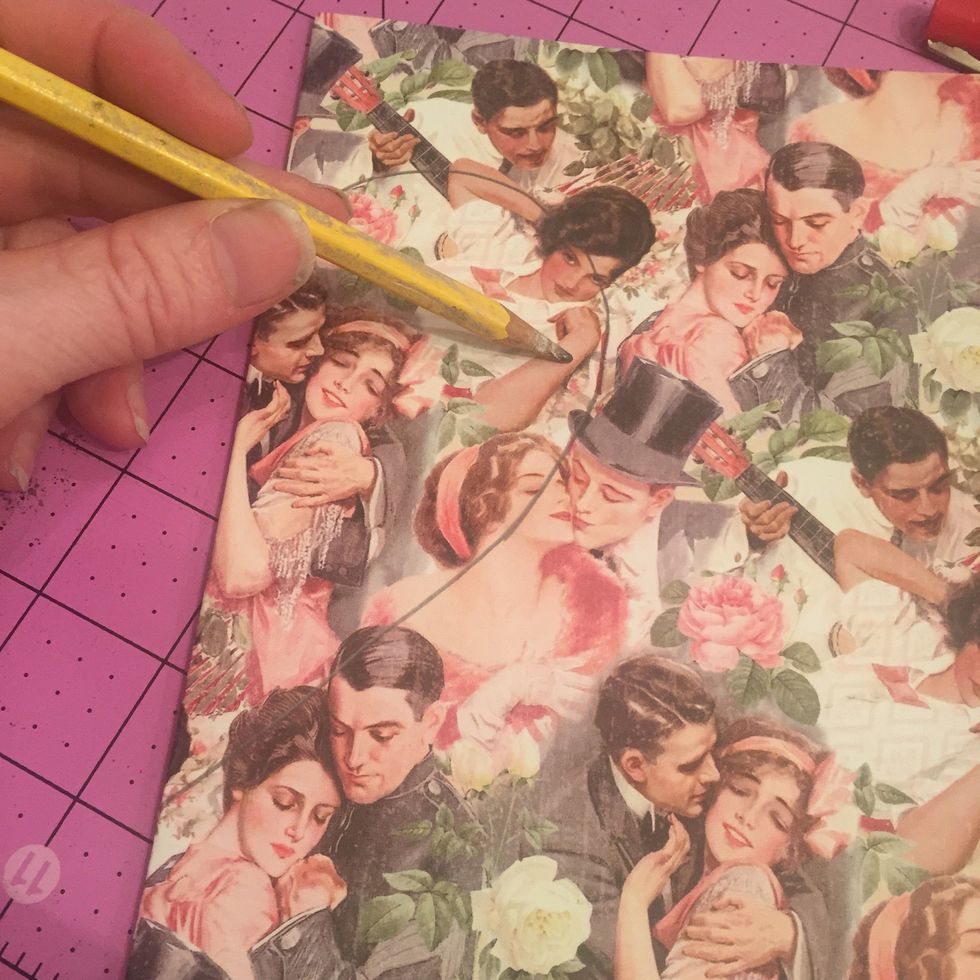 Now with a pencil draw a heart, starting at the top of the RED line, and then from the bottom- my pencil is pointing to the RED line. (use a different color than pencil- I just had red handy)