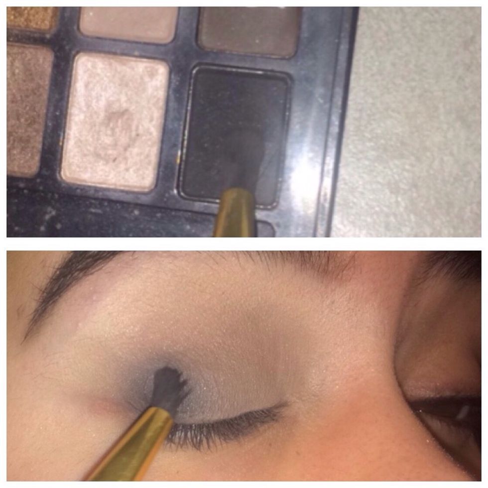 Now with a pencils brush pick up a little black, tap off the excess, and apply it strictly to the outer corner of your eye. Concentrate the black in this area.