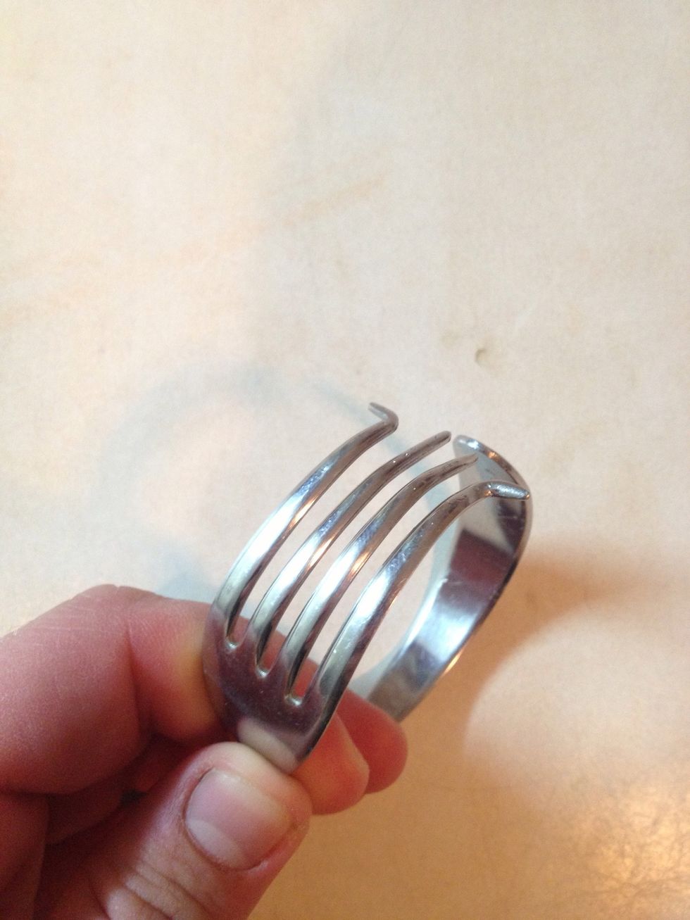 Now with the help of pliers you can bend the fork sides