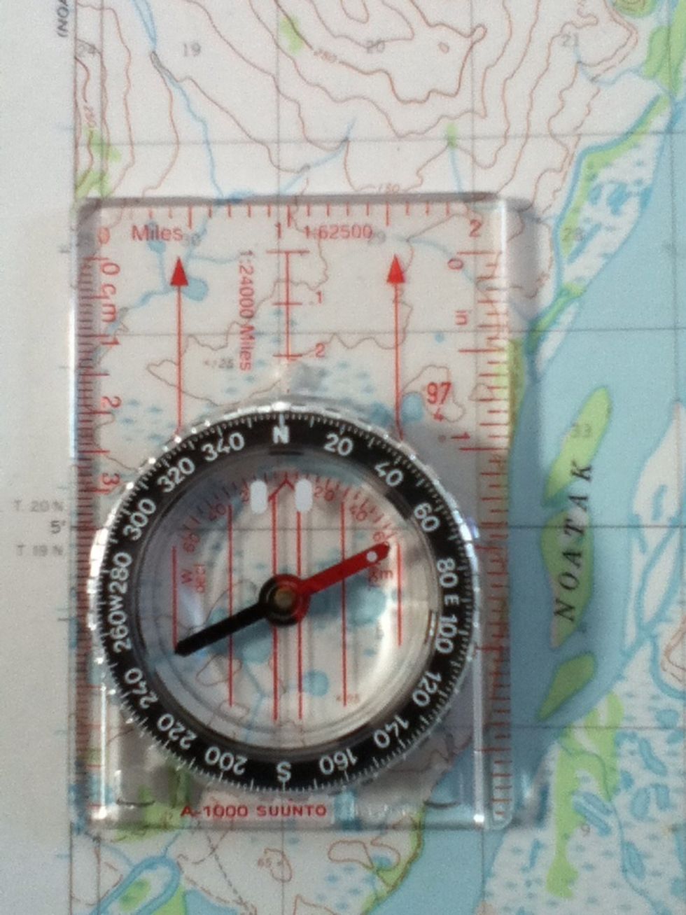 Now, without moving the compass, you will begin to rotate your map to the left or right.