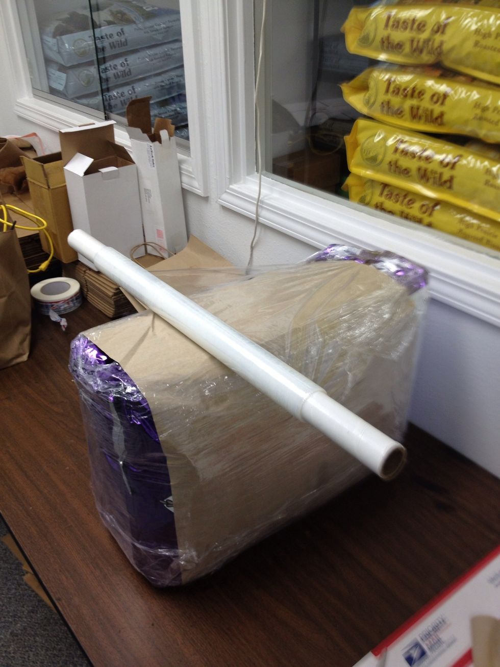 Now, wrap cellophane along the length of the side 2-3 Tim's around. Note, this is only necessary for a 2 bag order.