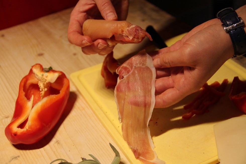 Now wrap the chicken in a slice of prosciutto