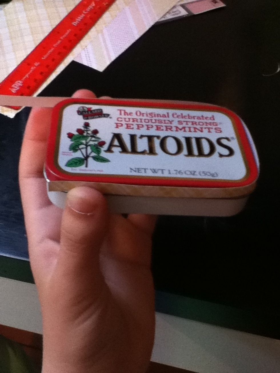 Now wrap your strip around the lid of your tin to see if it is long enough to wrap all the way around. If not, cut another strip to supplement it.