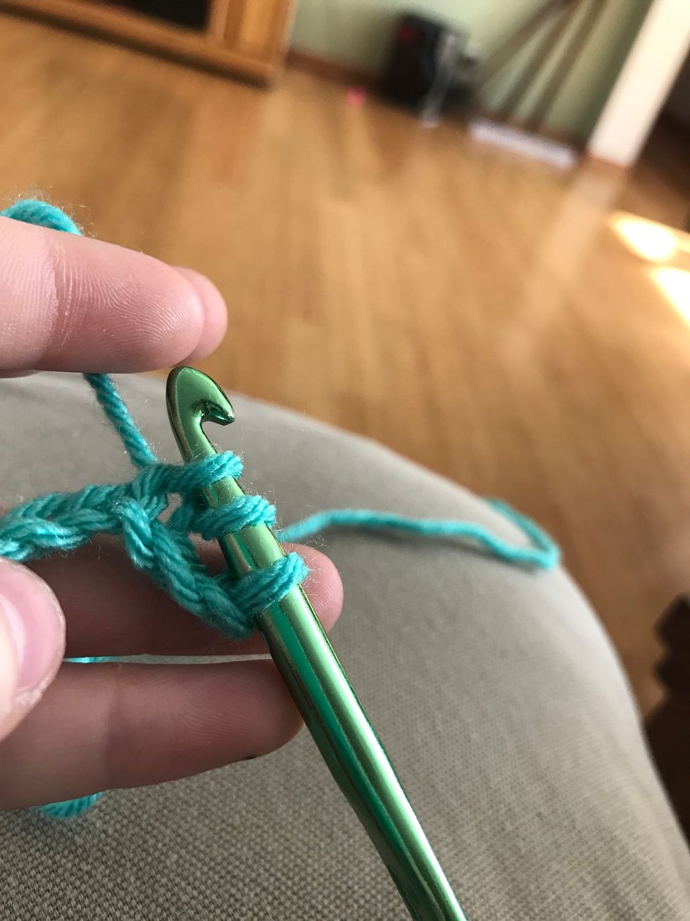 Now yarn over and pull 2 loops through