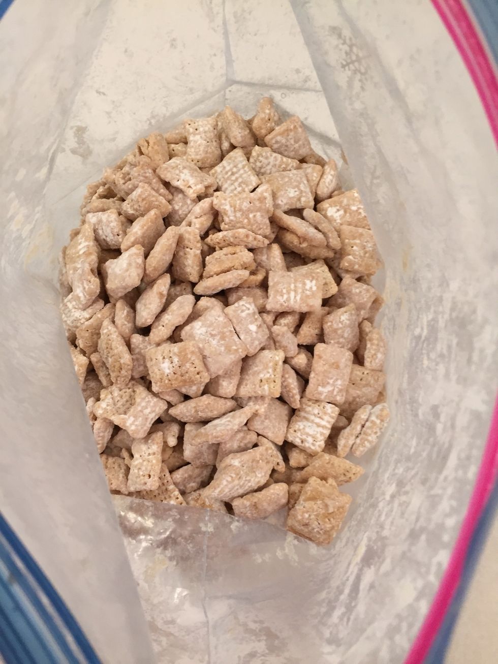 Now you are finished and have a delicious treat, white chocolate puppy chow, that you can share with anyone, or keep it all for yourself!