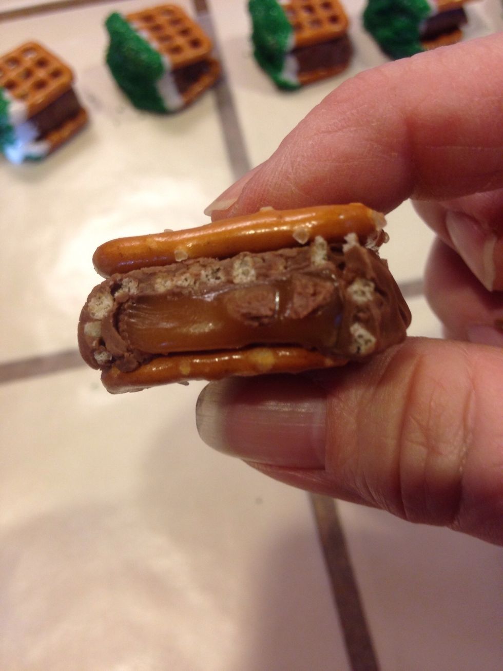 Now you are ready to dip. With the cut edge of chocolate, dip into melted candy coating.