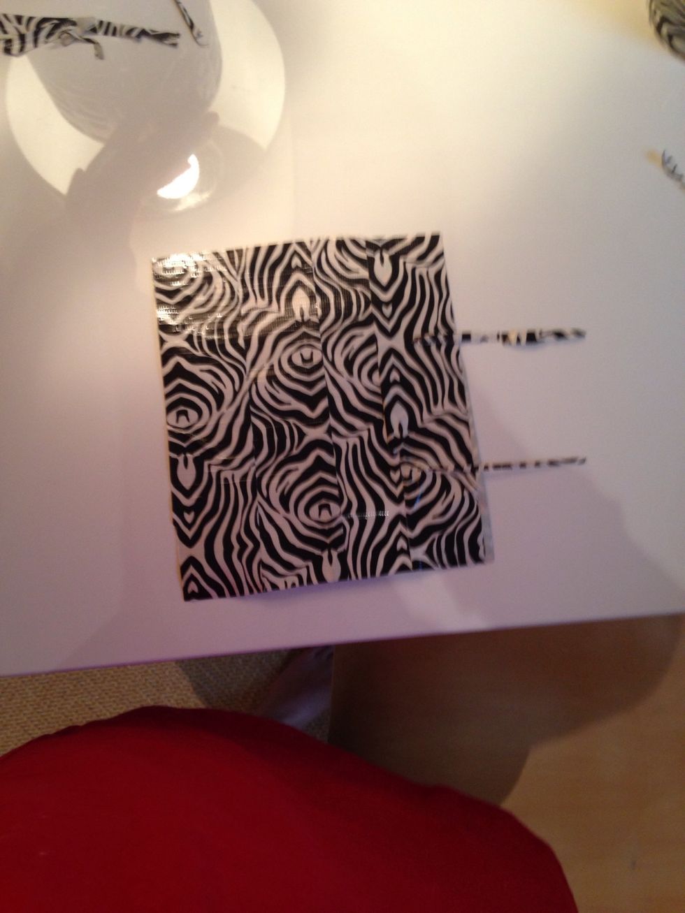 Now you can do this step mentally or with scrap pieces, split the tape Into thirds DO NOT CUT!