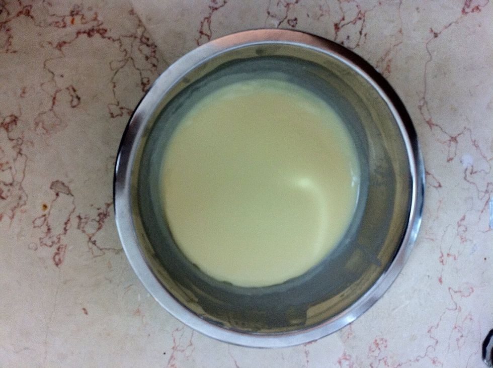 Now you can make the filling. Whisk the white chocolate for few seconds and add the coconut