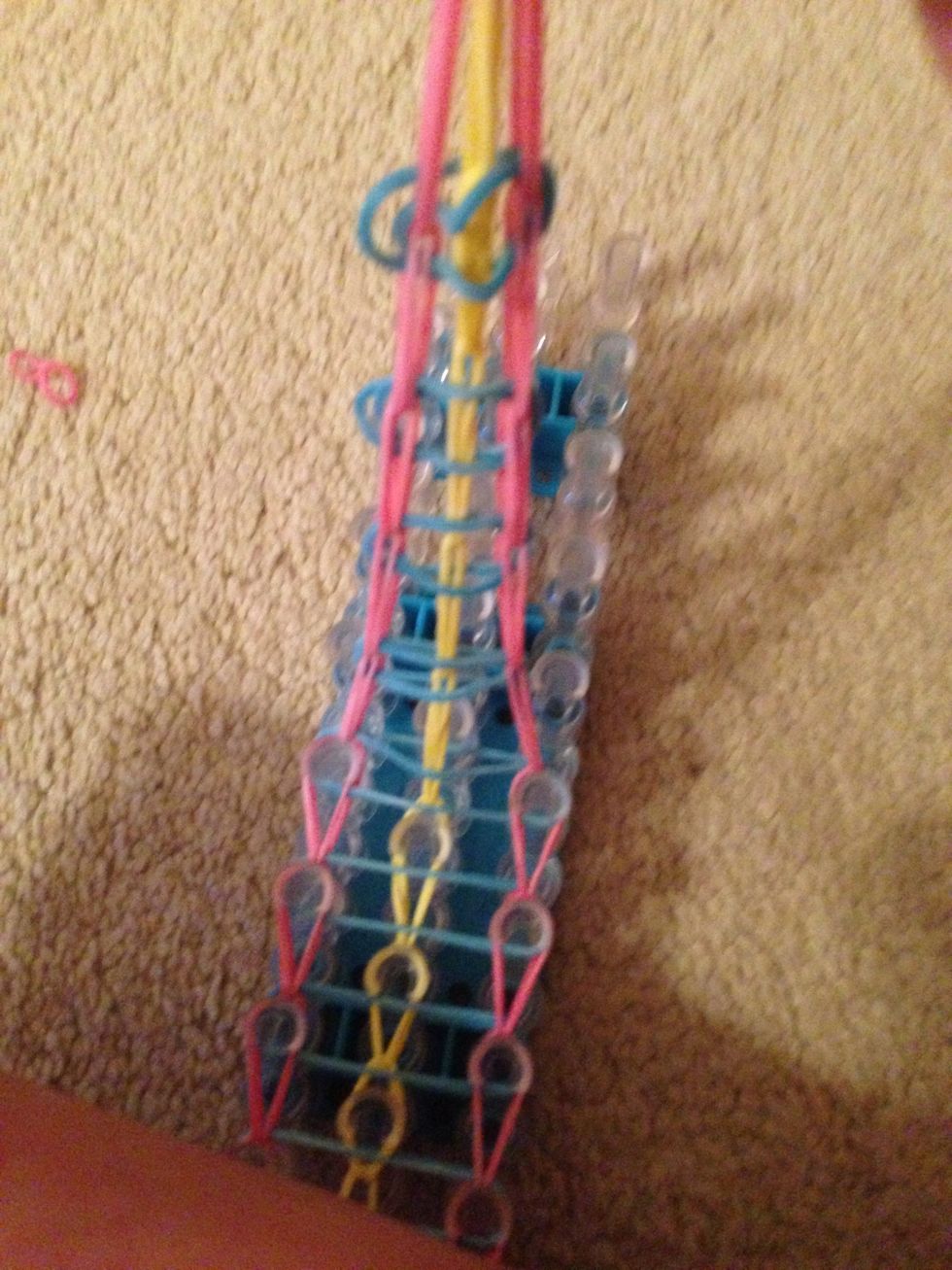 Now you can pull the bracelet off the loom