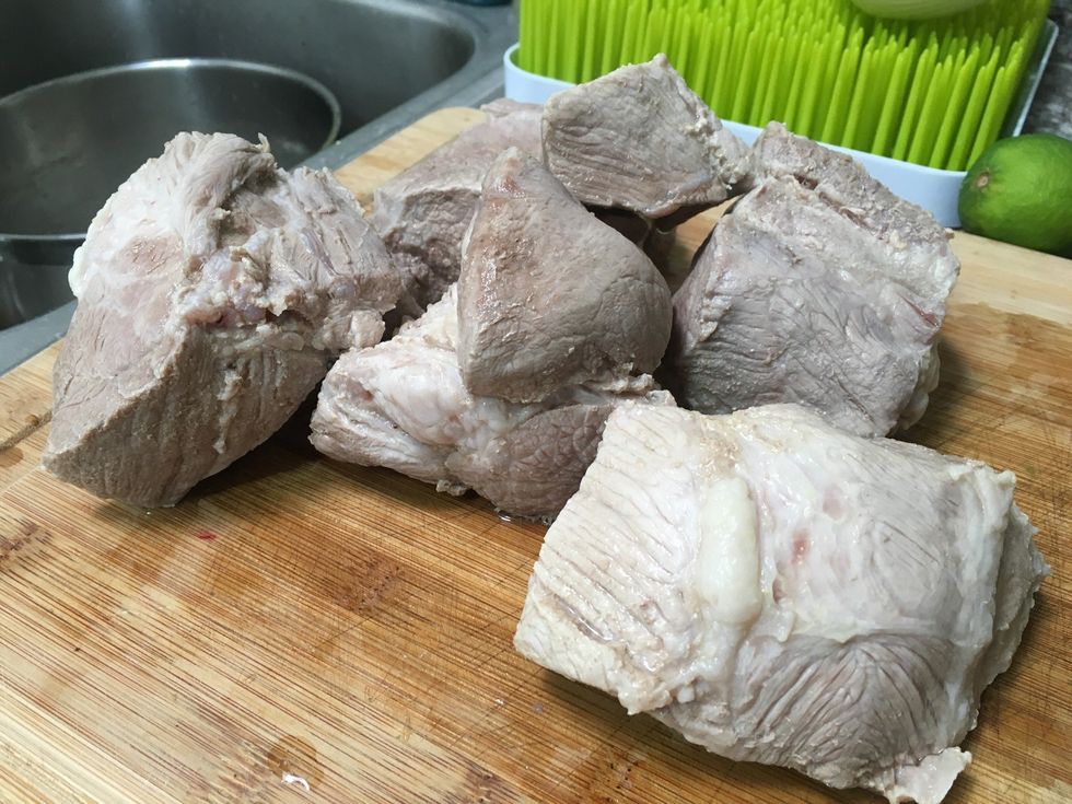 Now you can remove the meat from the water and rinse off any residue. Let it cool if its still hot or if its warm you can start to slice it. You can also leave it to cool completely to slice it easier