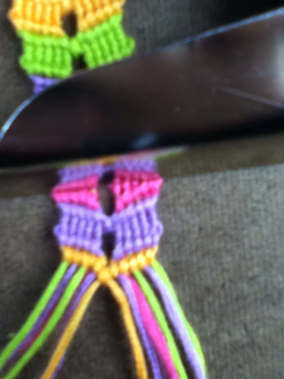Now you can tie the center strings with a right knot. Just continue from step 16 until your bracelets long enough.