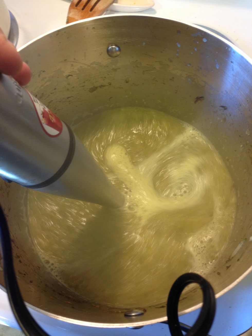 Now you can use a stick blender like I have or do the transfer to a blender/food processor in batches, but blend everything together and turn the heat to low.
