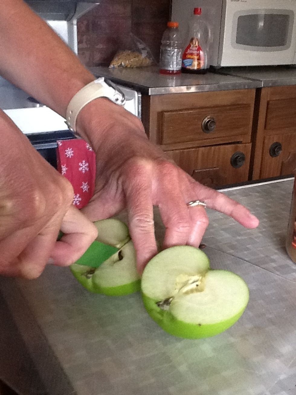 Now, you cut it into fourths by cutting the halves in half.