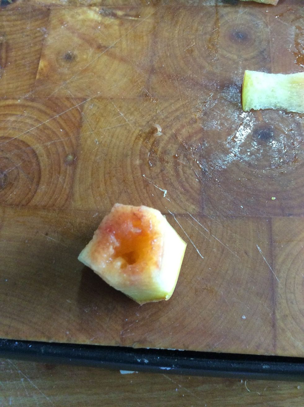 Now you , cut the peach so it is just the hole remember not to cut off the bottom