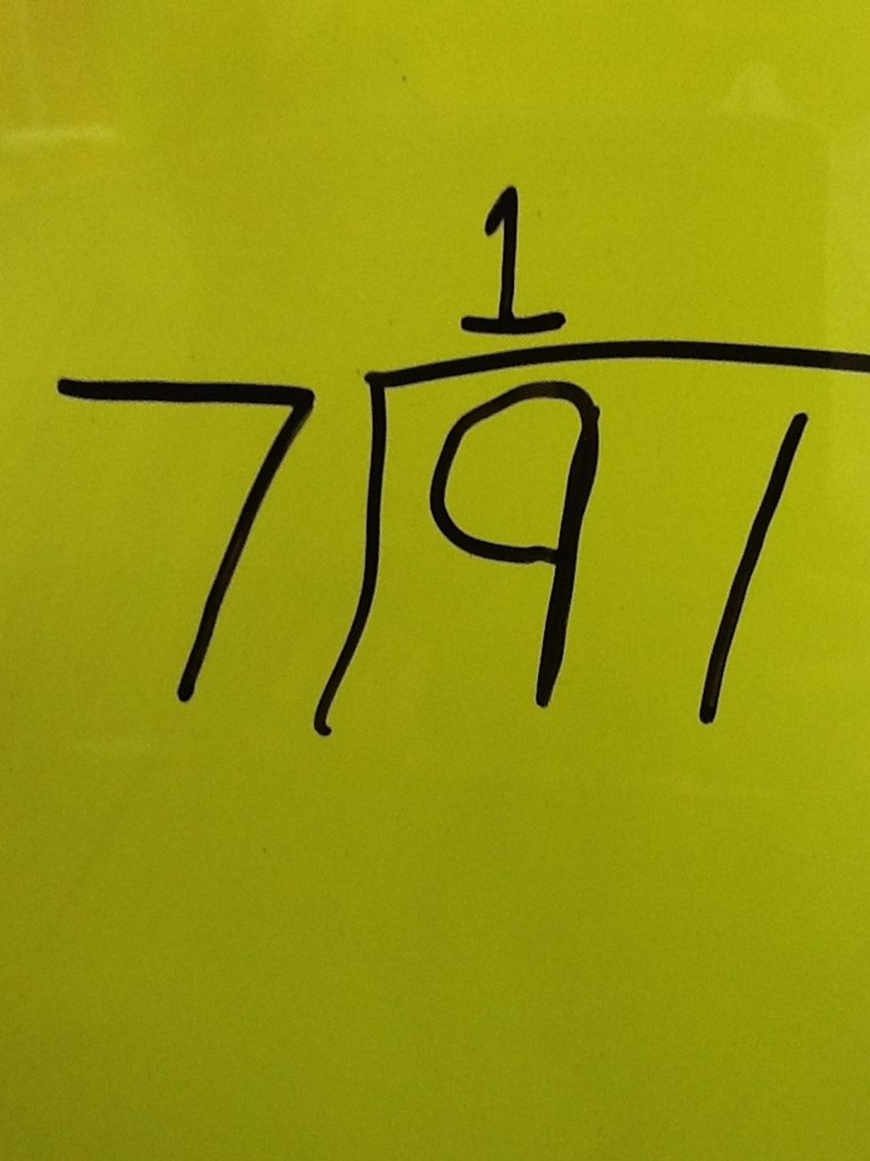 Now you divide 7 into 9 to get 1. Don't forget to put it above the line over the nine.