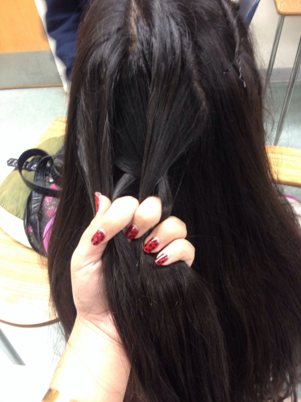 Now you do what you would do is braid it like a regular braid but only a little. Next you take a small or medium amount or however you want from any side and add it to the strand your about to cross