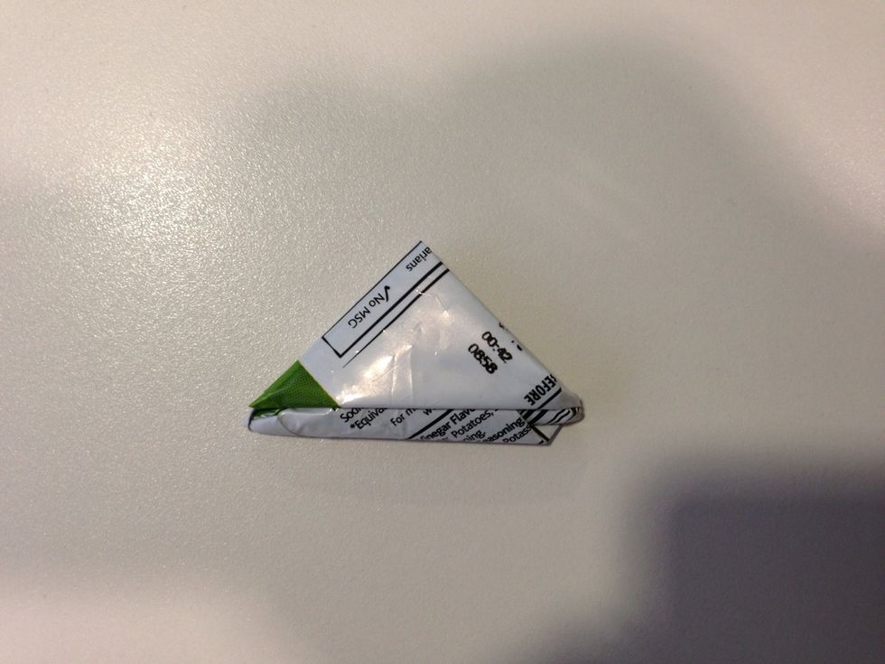 Now you have a neat and tidy crisp (chip) bag - no more scrunching them up and taking unnecessary space in the rubbish (trash).