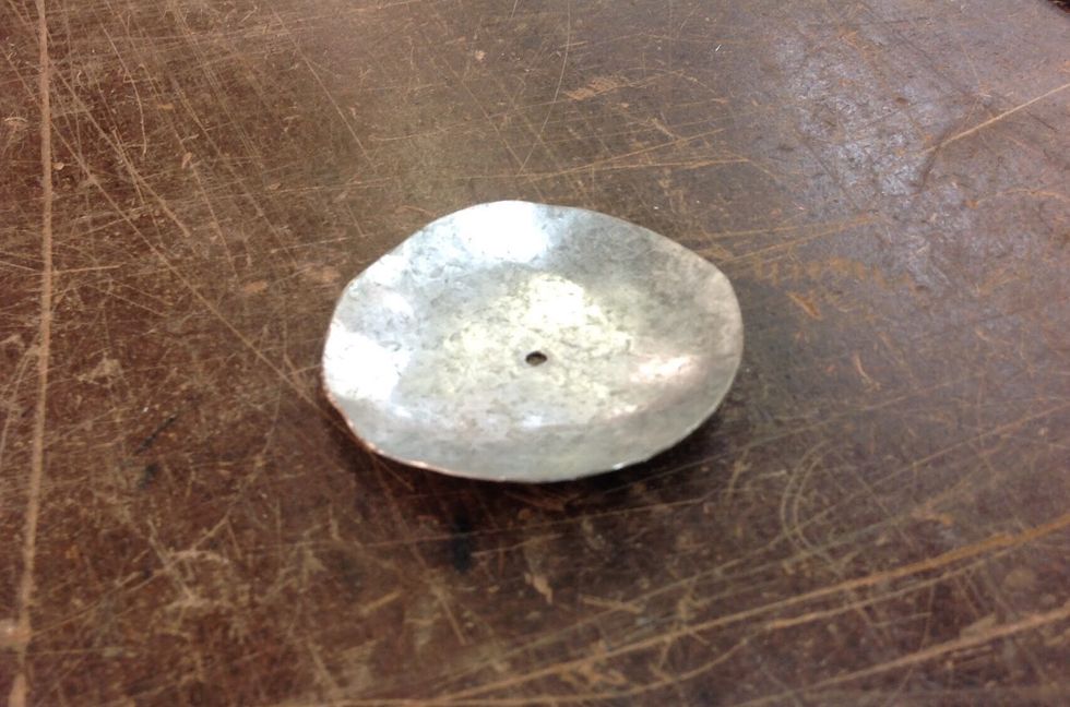 Now you have created your wax catcher. It should end up looking like this once you are finished. If there are any sharp or rough edges get a file and file them until smooth.