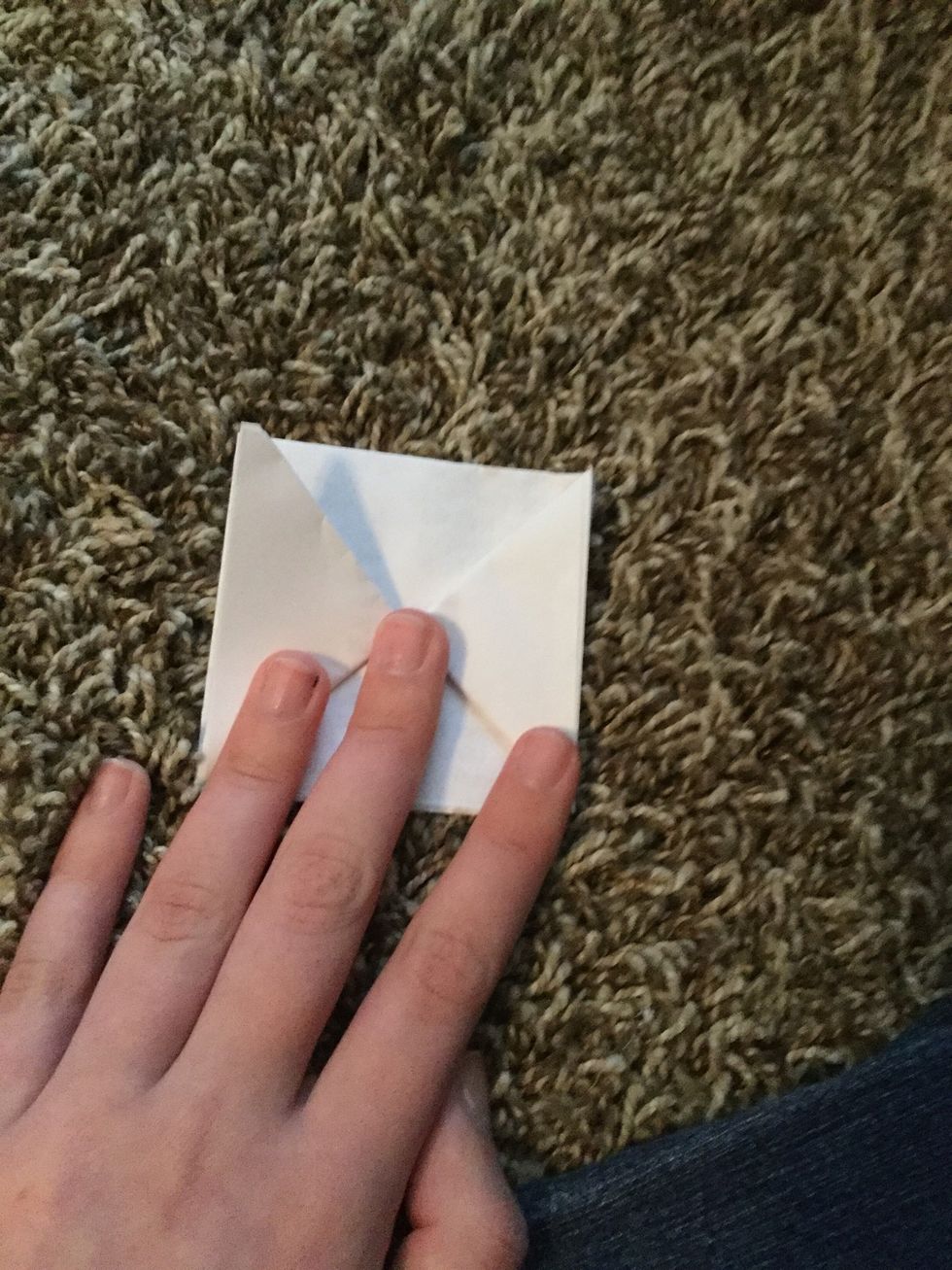 Now you have this bow tie shape. Unfold the triangles you just folded.  Repeat for the other paper. \u27a1\ufe0f\u27a1\ufe0f