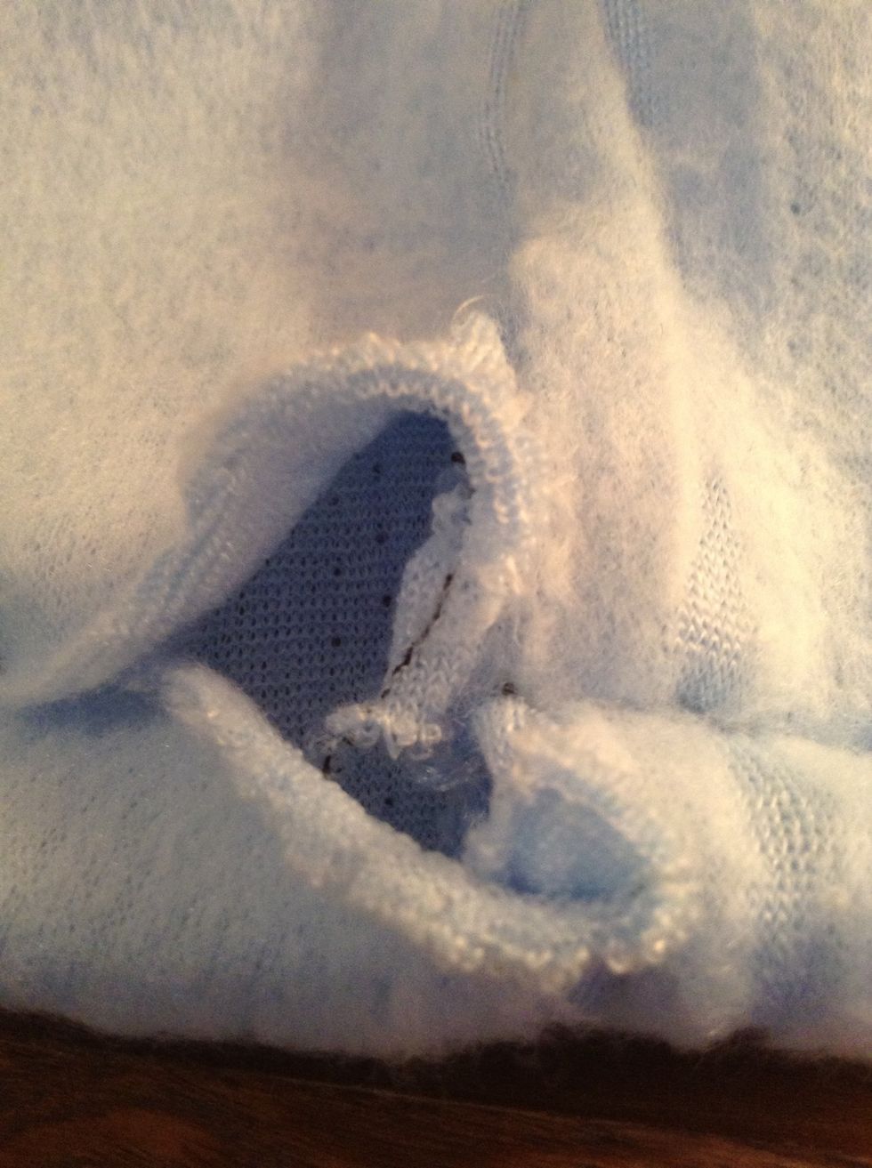 Now you have to hand-sew this part that we had from the beginning.