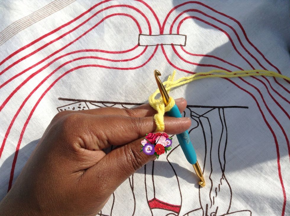 Now you have your loop on the hook.  Please excuse my bitten fingernails. It's a habit I'm working on. *sigh*