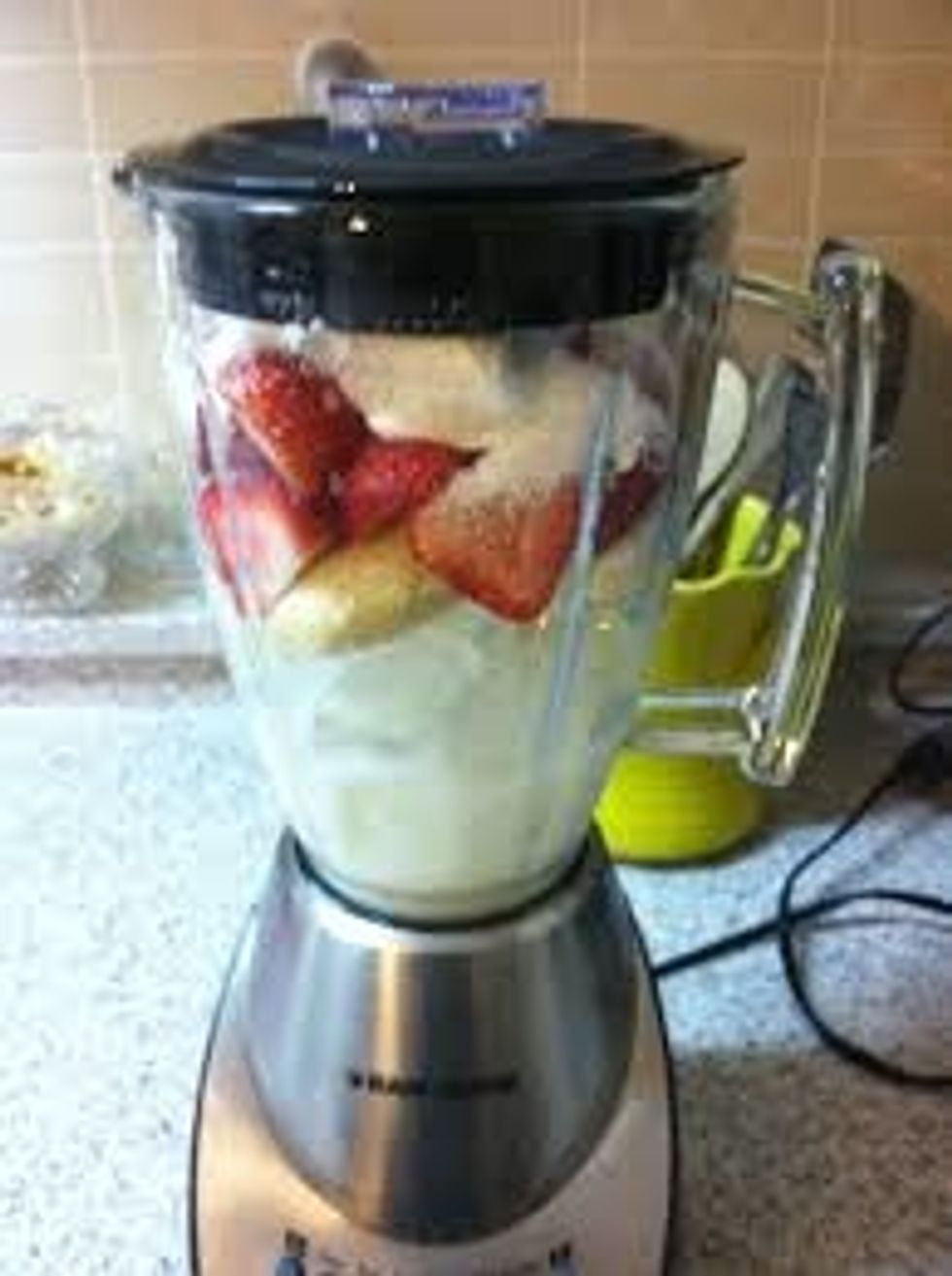 now you insert all the ingredients in your blender *if you want more popsicles have more fruit in your blender*