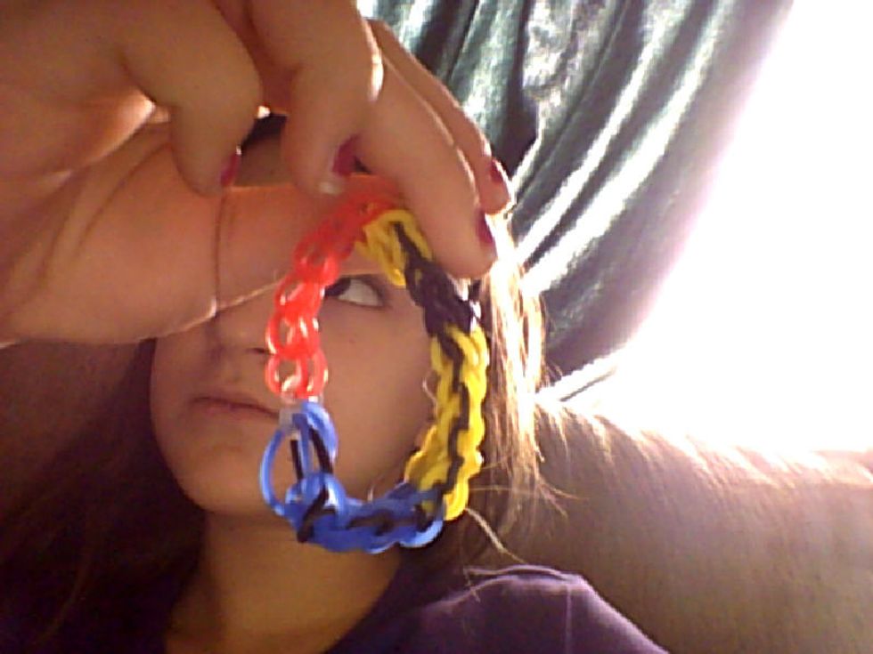 Now you just put all of the bands on the end and hook it.