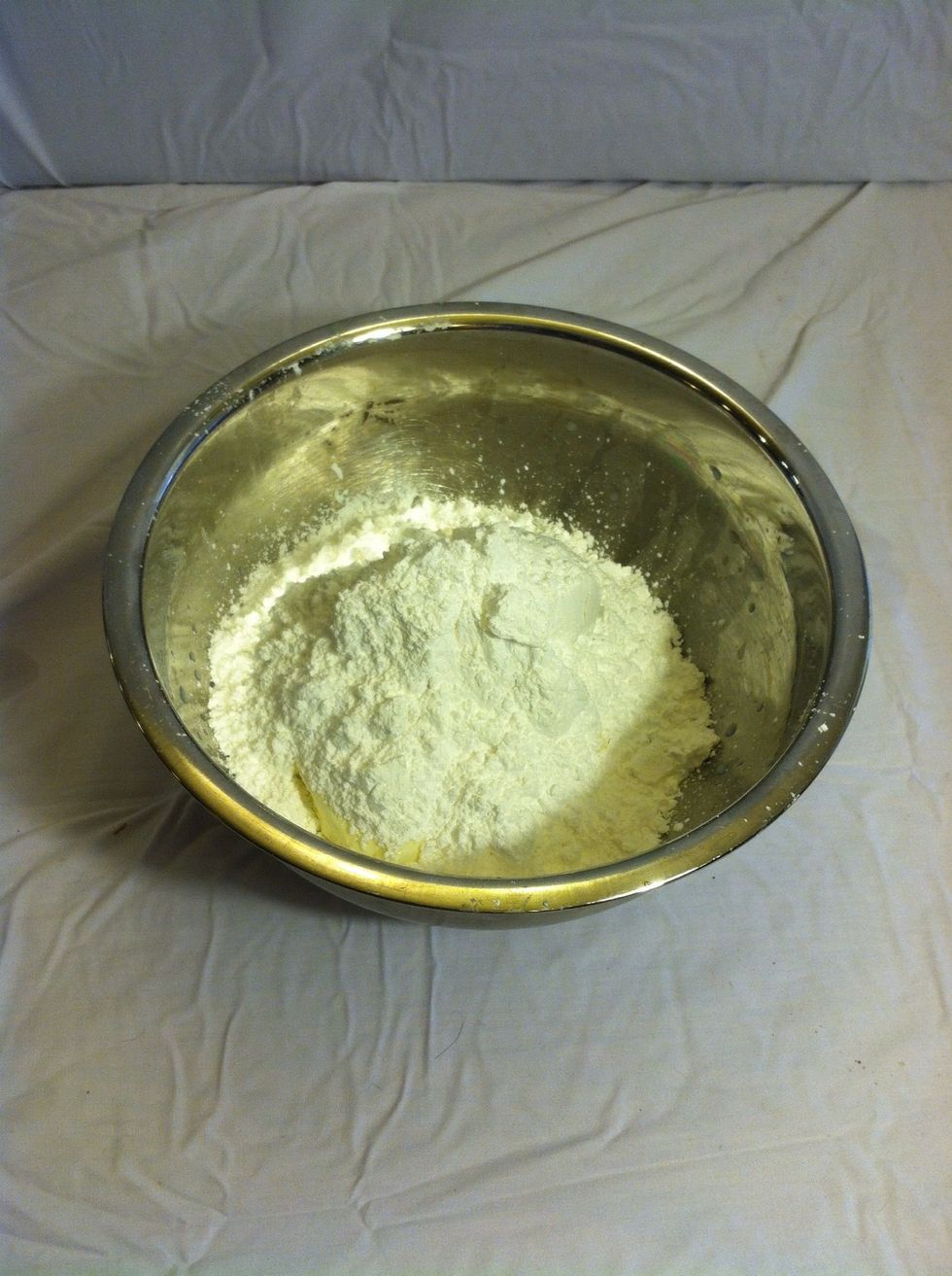 Now, you'll need to add in 4 cups of confectioners sugar.