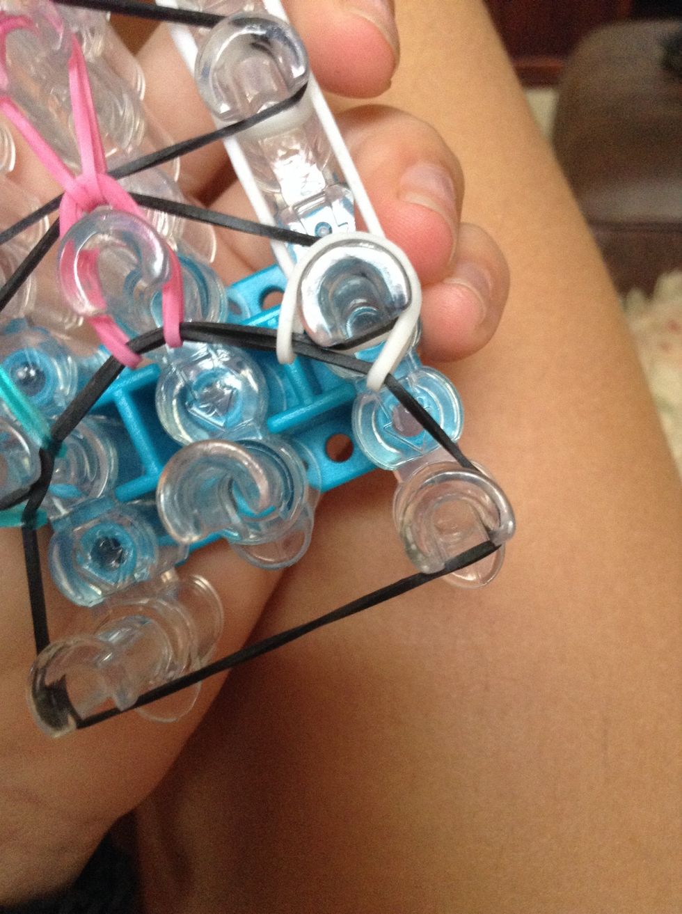 Now you need to hook the last row like a regular single while pushing the bottom of the triangle down.