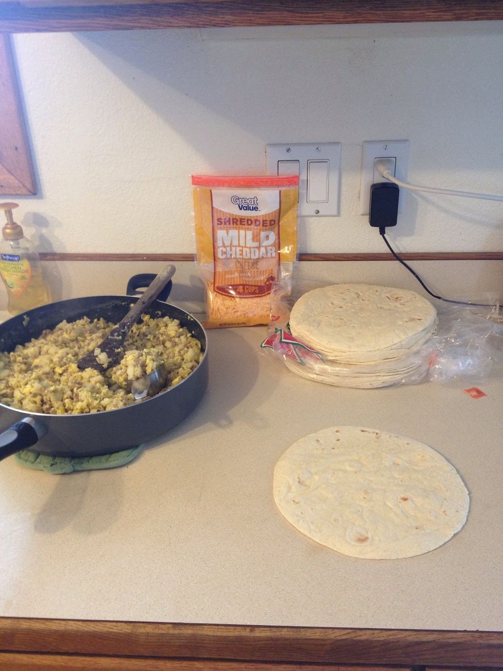 Now you're ready to build the burritos. Heat the tortillas in microwave about 35 secs to soften