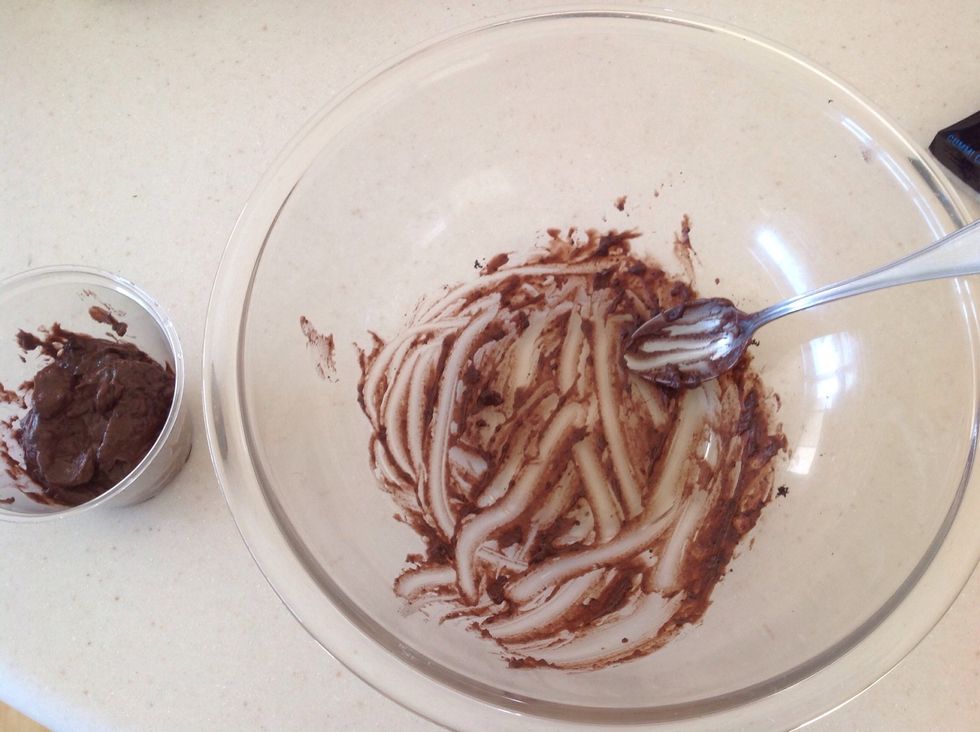 Now you're ready to construct your "Worms in Dirt." Scoop the mixed pudding into the bottom of a clean cup.