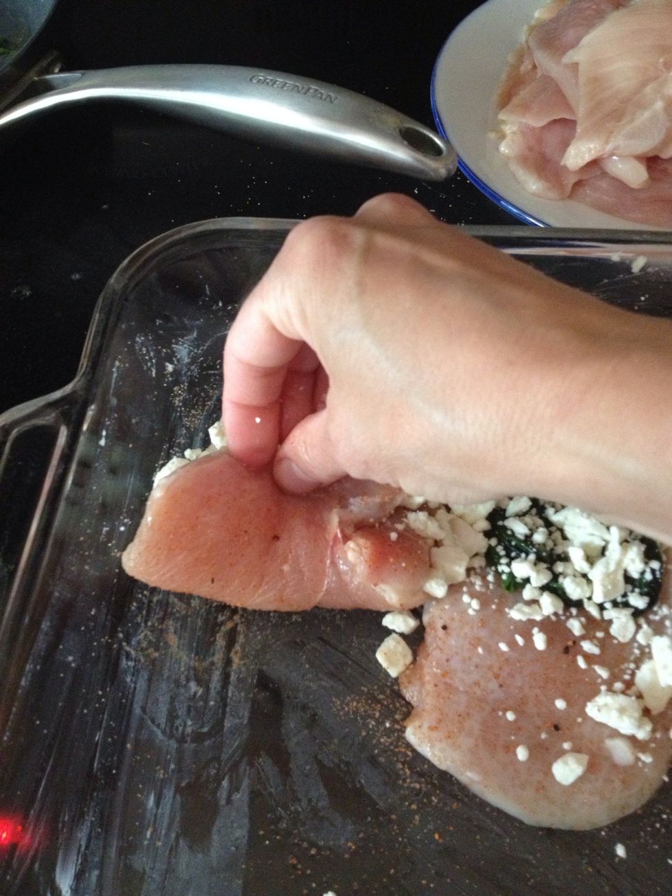 Now you roll the chicken up from one end to the other....