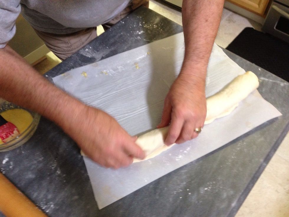 Now you see why we left one edge clean - roll up to it and press the edge of the roll to the end of the rectangle to seal the whole thing up!