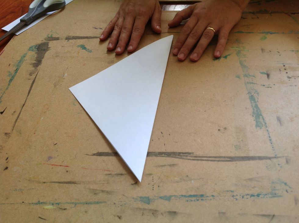 Now you should have a folded triangle.