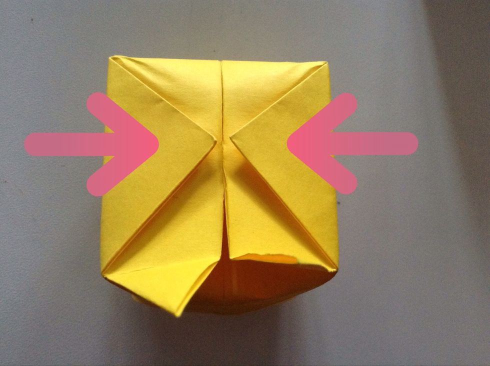 Now you should tape or glue the flaps (pointed at with arrows). I glued my flaps!