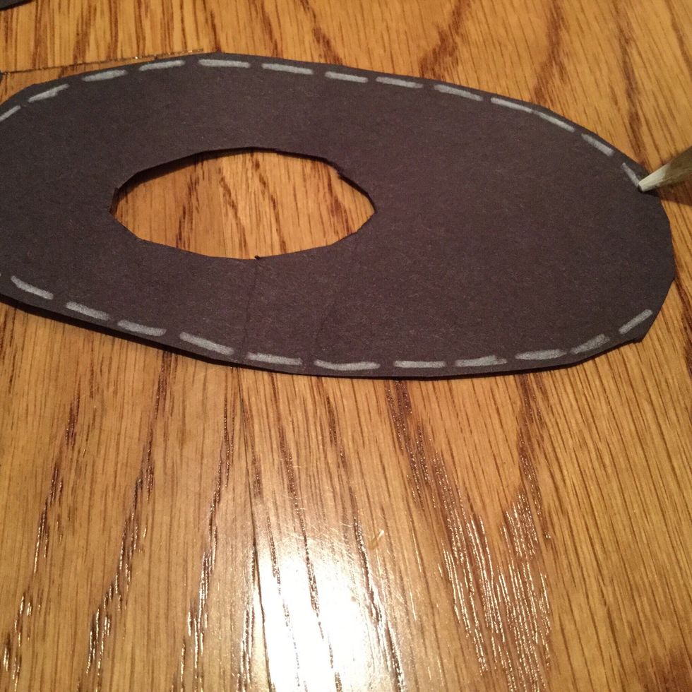 Now, you should turn your letters over and draw little white lines around the edges with your white colored pencil. Try to make them look like stitches.