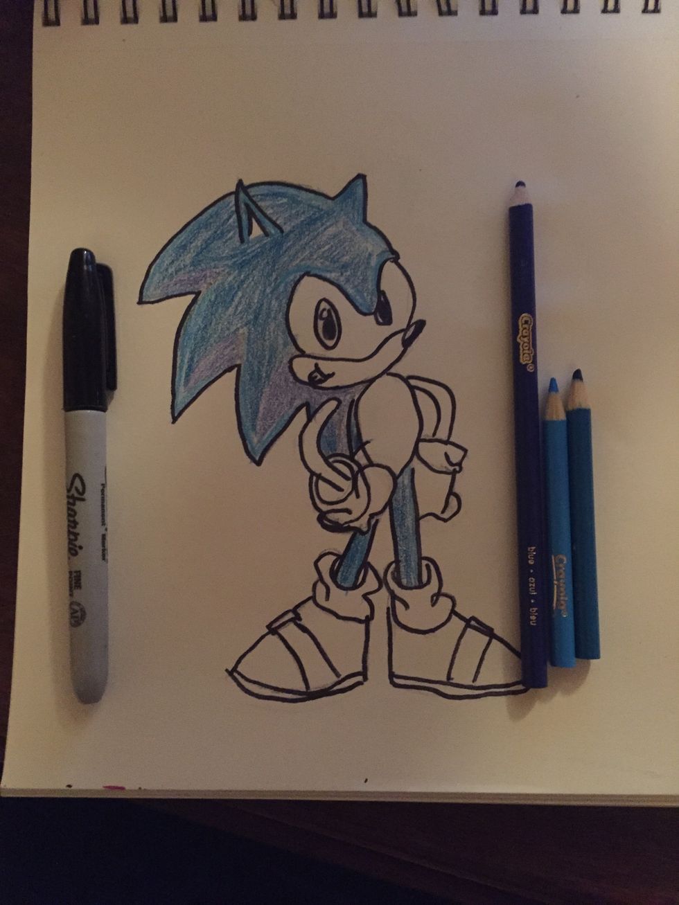 Now you start to color him blue (I use 3 different color blues) and go over with sharpie ( if you want to)