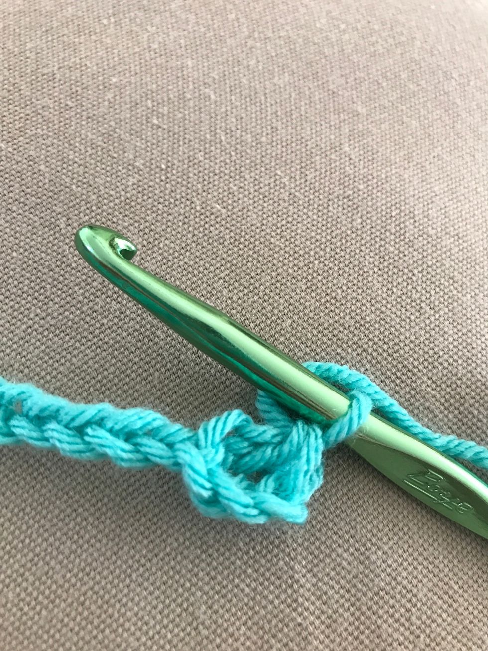 Now you've got your first double crochet stitch