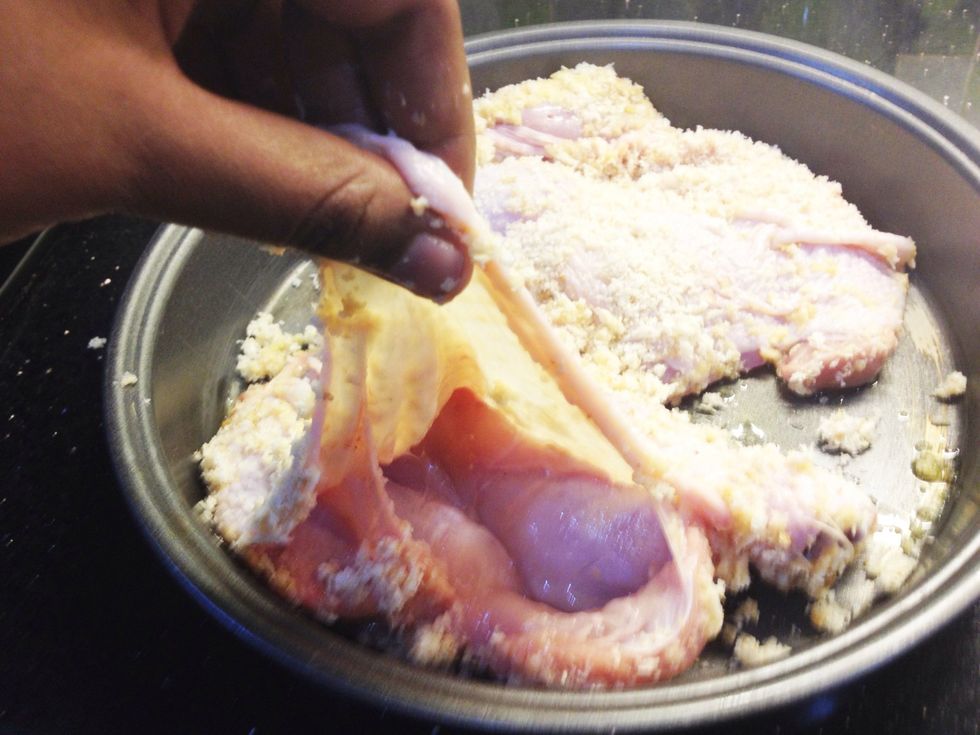 Now you wanna open the chicken, meaning carry up the skin of the chicken cause we are gonna fill it with the cheese sauce \ud83d\ude0f