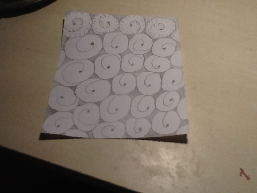 Now you want to make curved lines on the spirals. Like this...