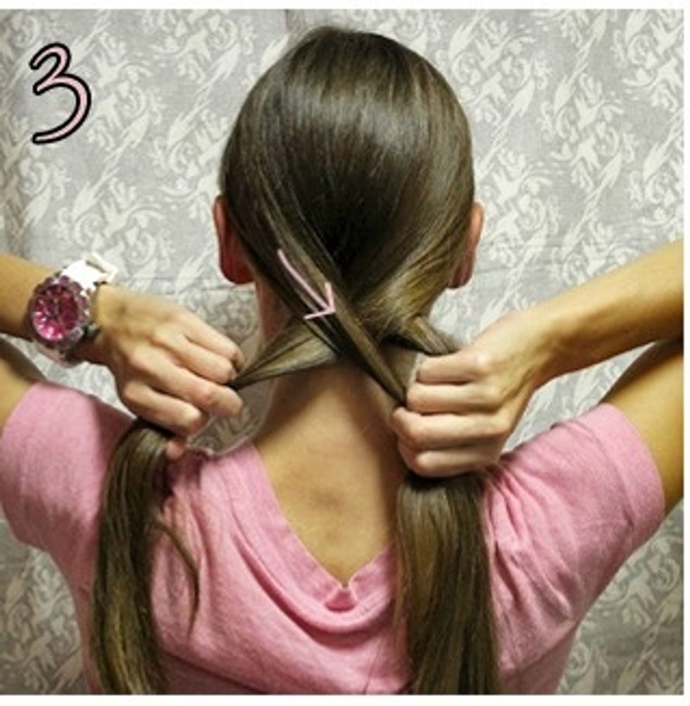 now you want to take the opposite side and cross that over the new middle section that you just made