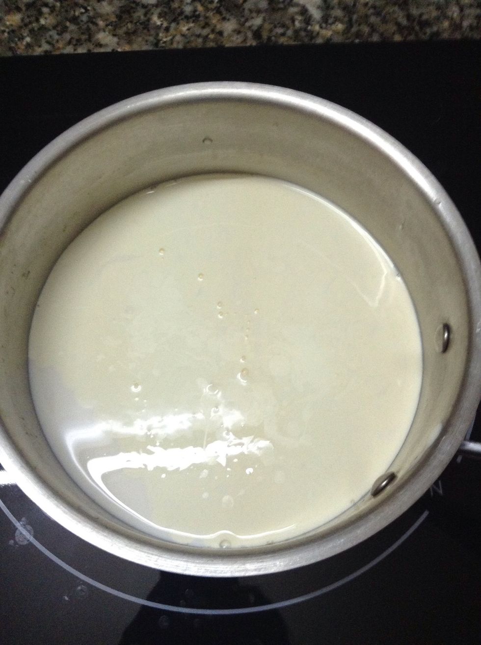 Now you will boil the milk and whipping cream on low heat, this is the time you put matcha powder into it as much as you can taste the matcha flavor, stir the matcha till disolve, turn off the heat.