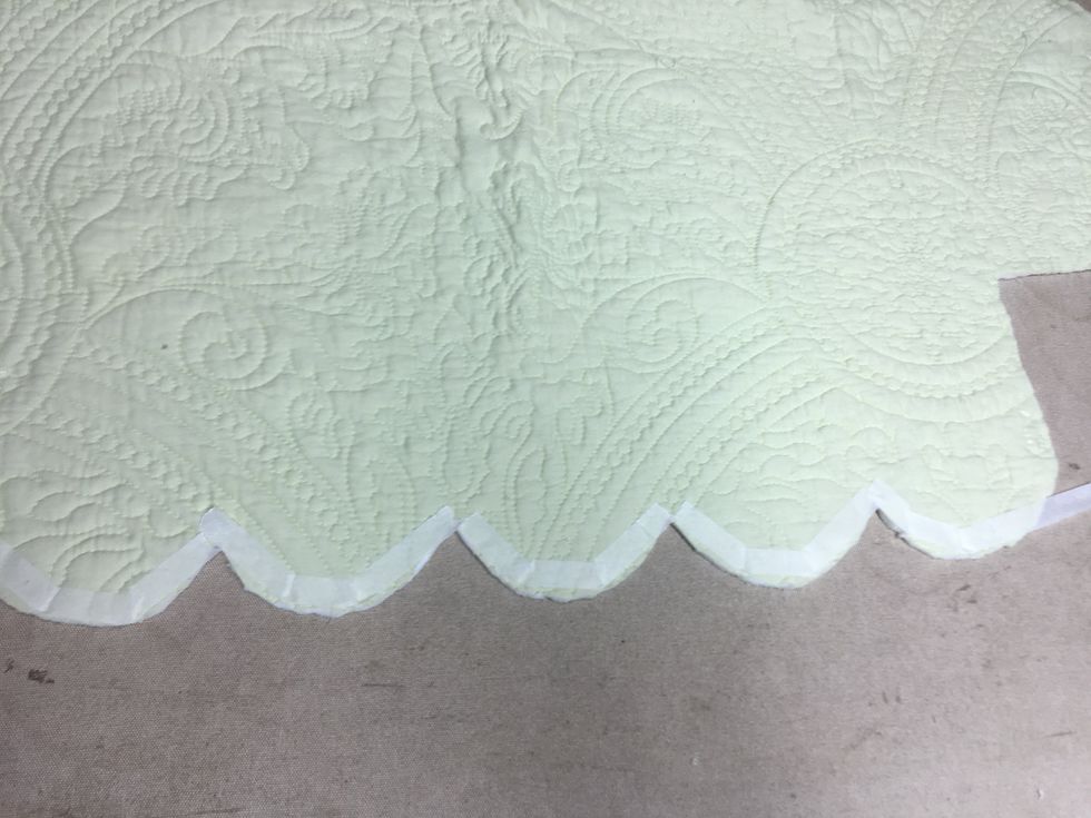 Now you will bond these two fabrics together.  Working with the top slip, Iron SteamASeam2 to the edges of the wrong side of the top slip all the way around as shown.