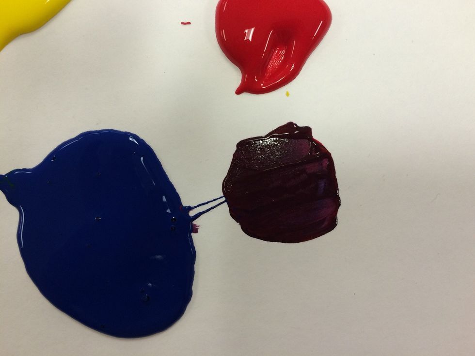 Now you will make your last secondary color: PURPLE. Drag a small amount of red to the side. Add an even smaller amount of blue. This should make PURPLE.